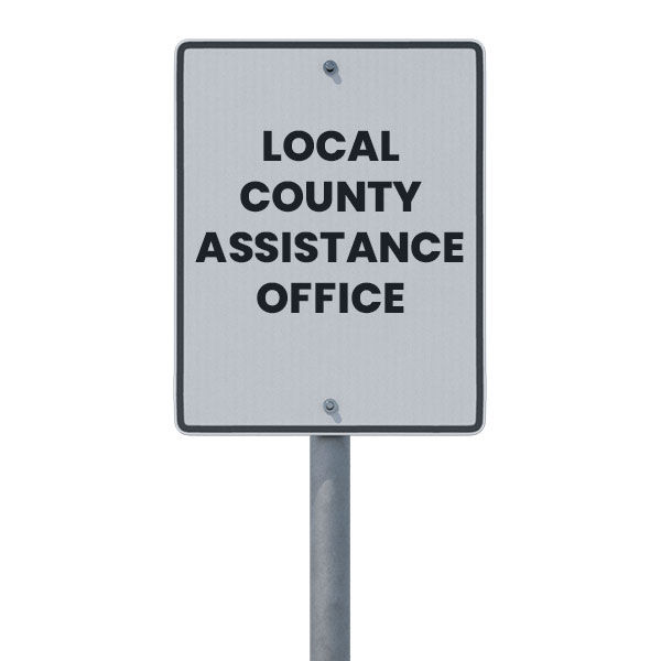 Parking sign that reads "Local county Assistance Office"
