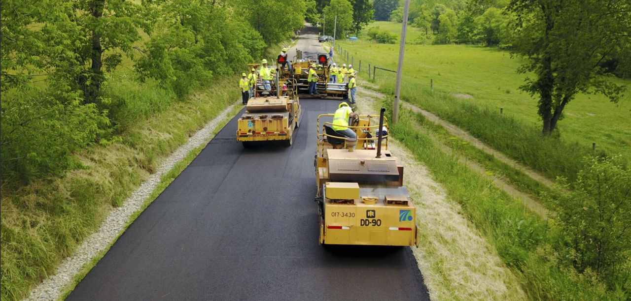 PennDOT employees paving a road