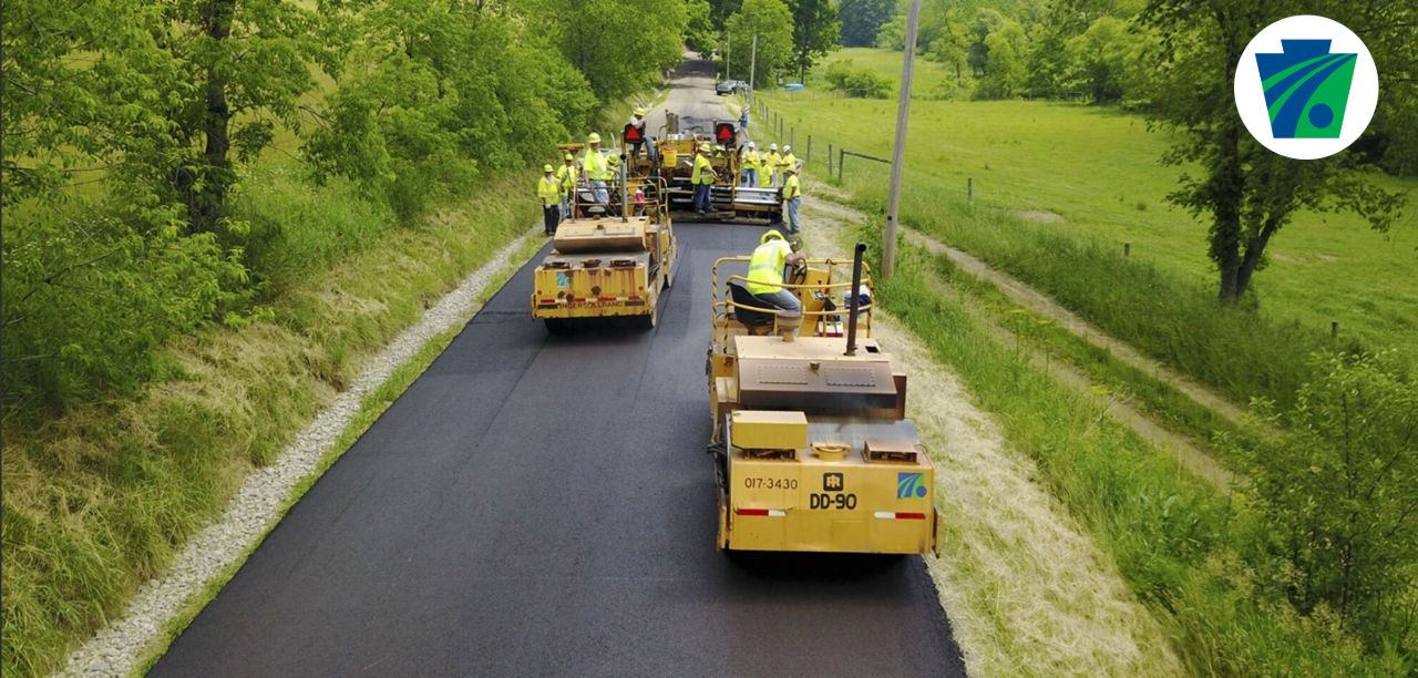 PennDOT truck plowing a wintry road