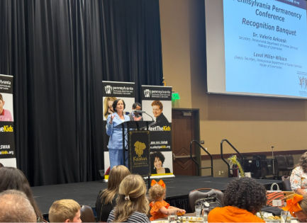 Secretary Arkoosh presents awards at the 34th Annual Pennsylvania Permanency Conference
