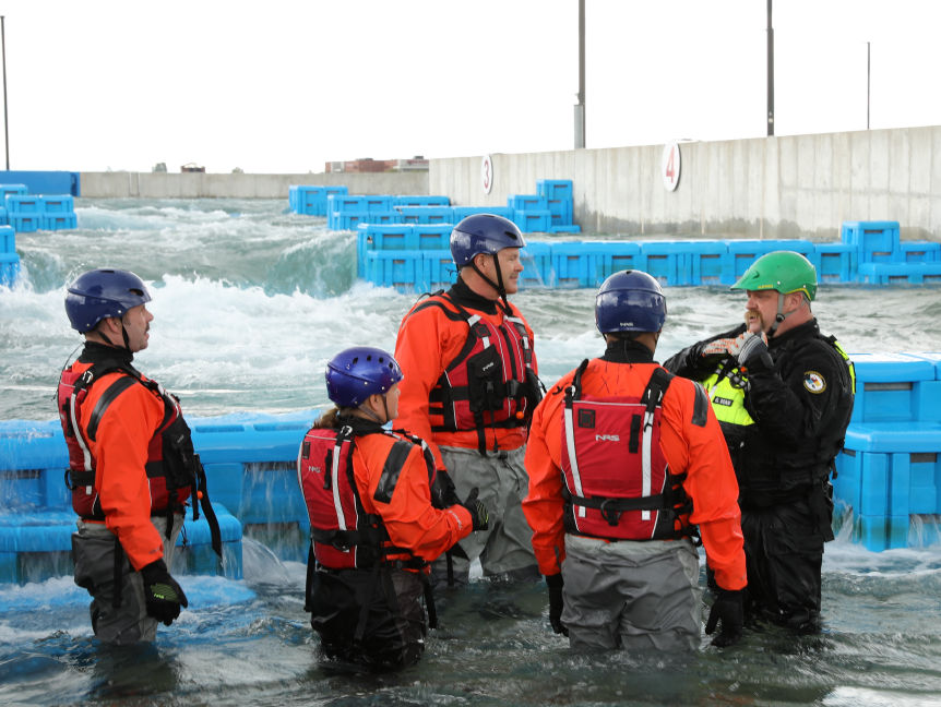 Pennsylvania Emergency Management Agency representatives train at a swiftwater rescue facility.