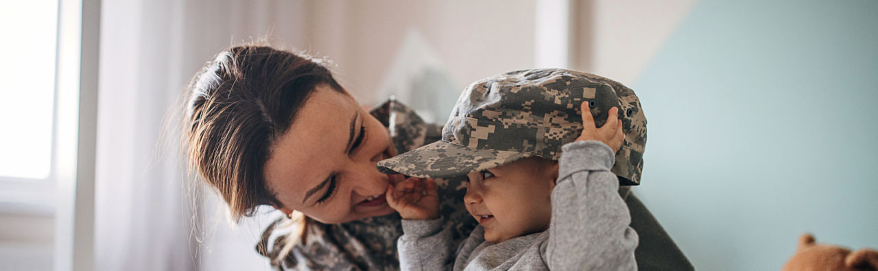 Military mother with young child