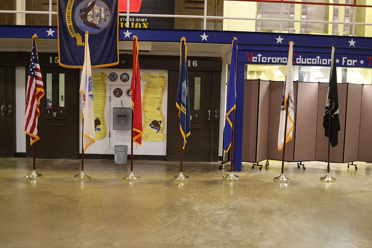 A row of flags in a housing unit