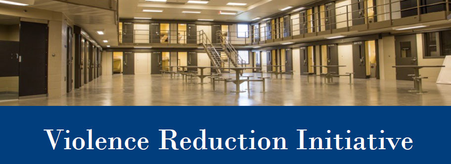 A prison housing unit above the words "Violence Reduction Initiative"