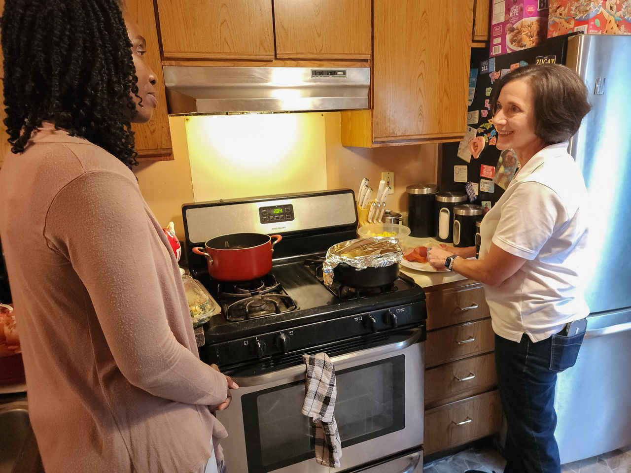 Secretary Arkoosh visits with Cheryl Harp