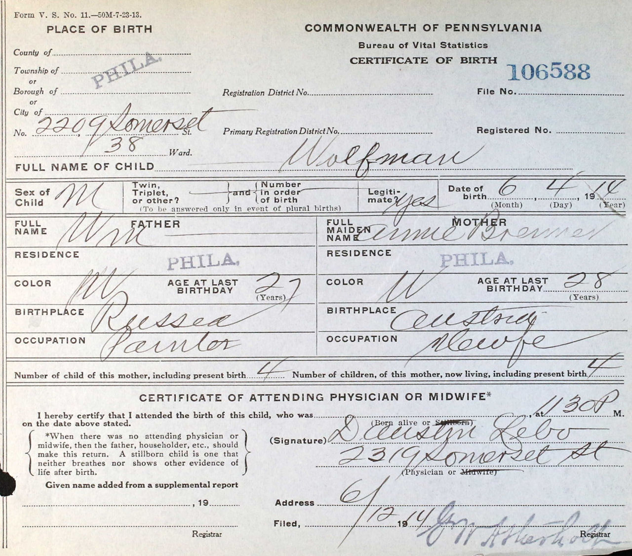 A 1914 certificate of birth for a child with the last name of Wolfman