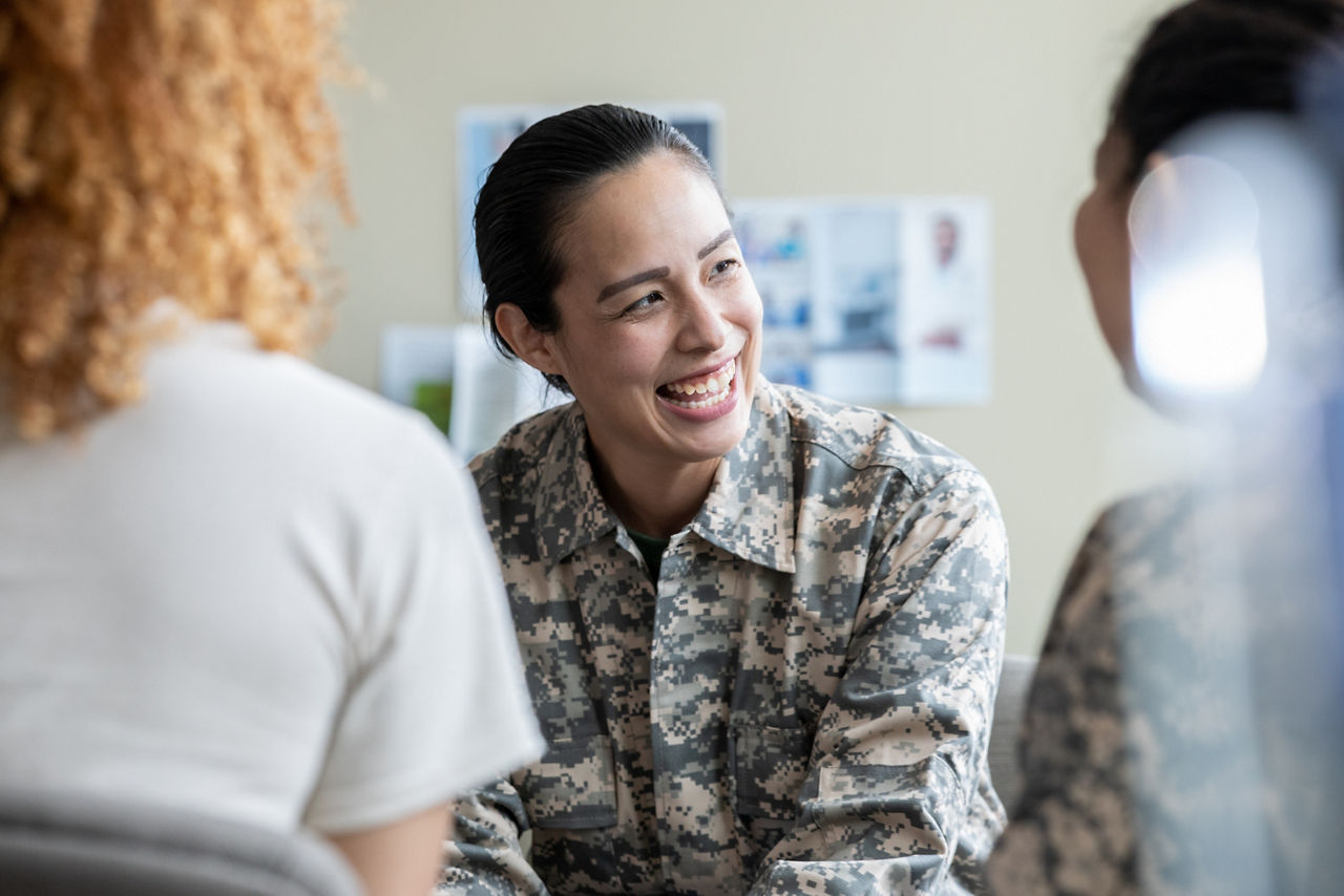 Veteran speaking with other people