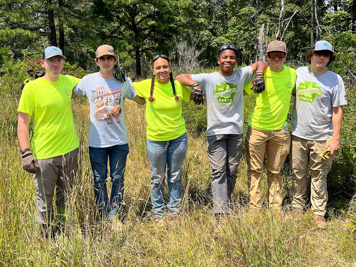 Outdoor Corps Youth Crew Members pose for a group photo.