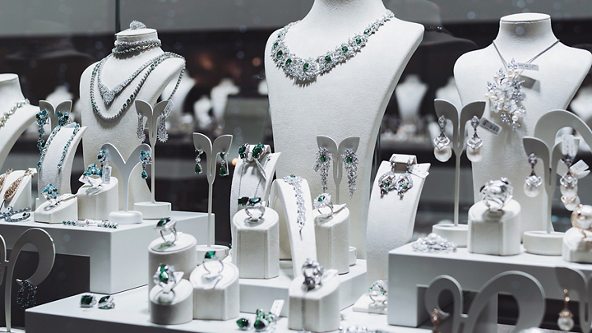 Jewelry store display with earrings, rings, and necklaces 
