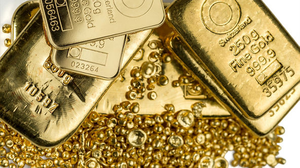 Close up of bars and pieces of gold 