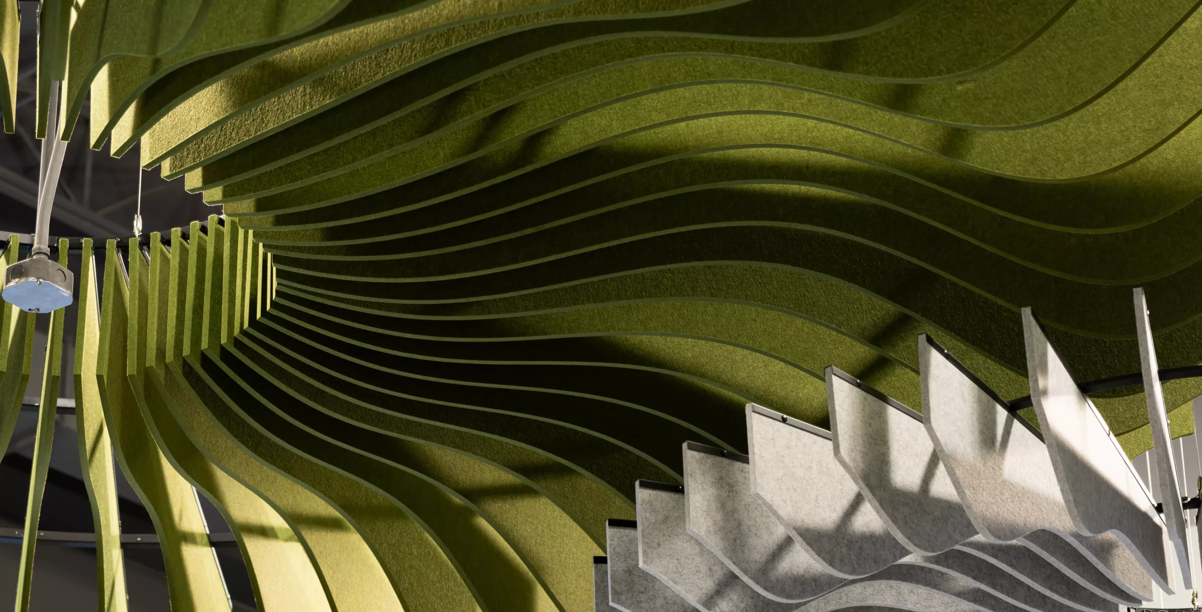 USG Ceilings Plus® Design Solutions Colortex™  Radialz™ Acoustical Panel Solutions – Drop, Photo: Fungi Media © USG Interiors, LLC