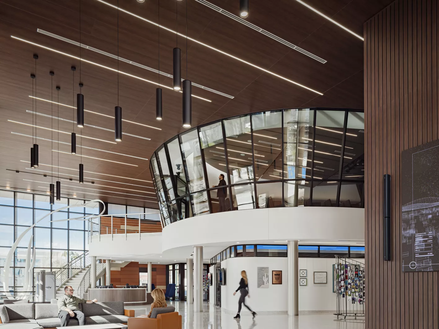 USG Ceilings Plus® Illusions® Metal Panel Ceiling System, USG Ceilings Plus® Planx™ Linear Metal Panel Wall System, Architect: Adaptive Architects and DLR Group, Photo: © Jason Roehner