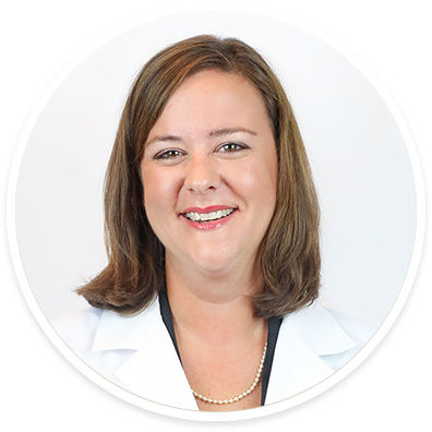 A circular portrait of Amanda White, MD