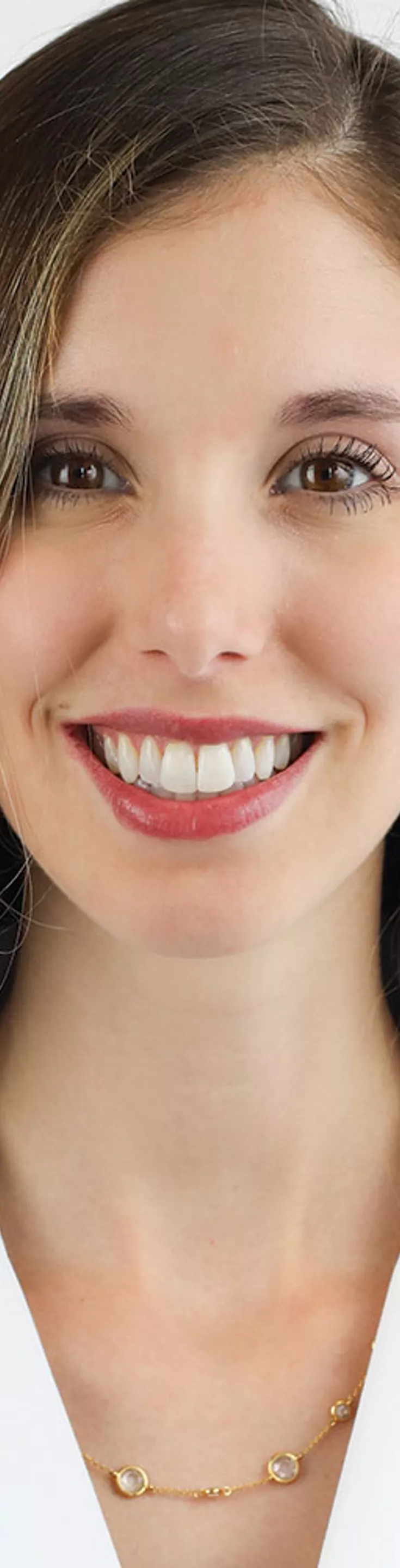 Headshot of Amy Papermaster.  She is wearing a white coat and a red blouse.