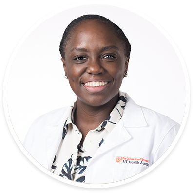 A circular portrait of Nerlyne Desravines, MD.