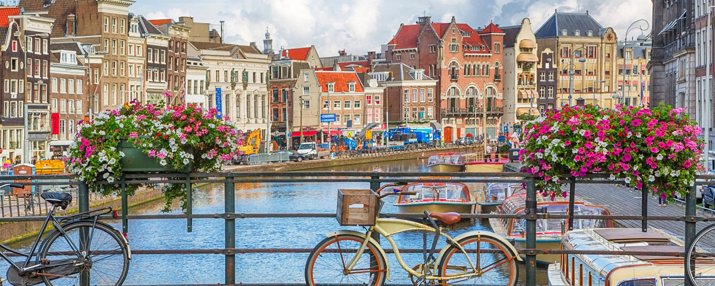 Scenic Amsterdam canal with bicycles