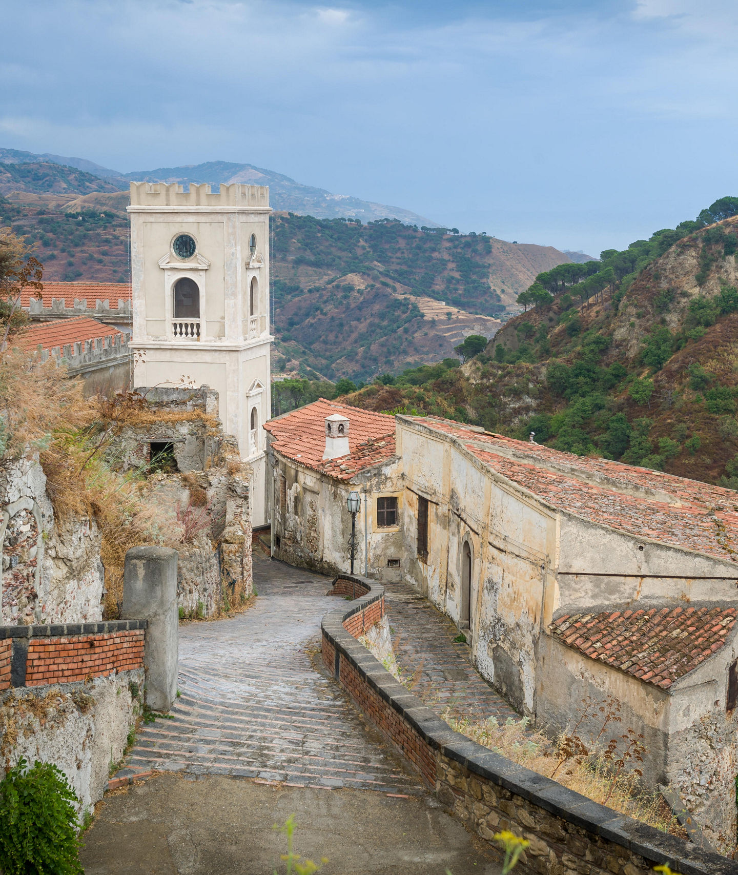Historic hillside village with stone pathways
