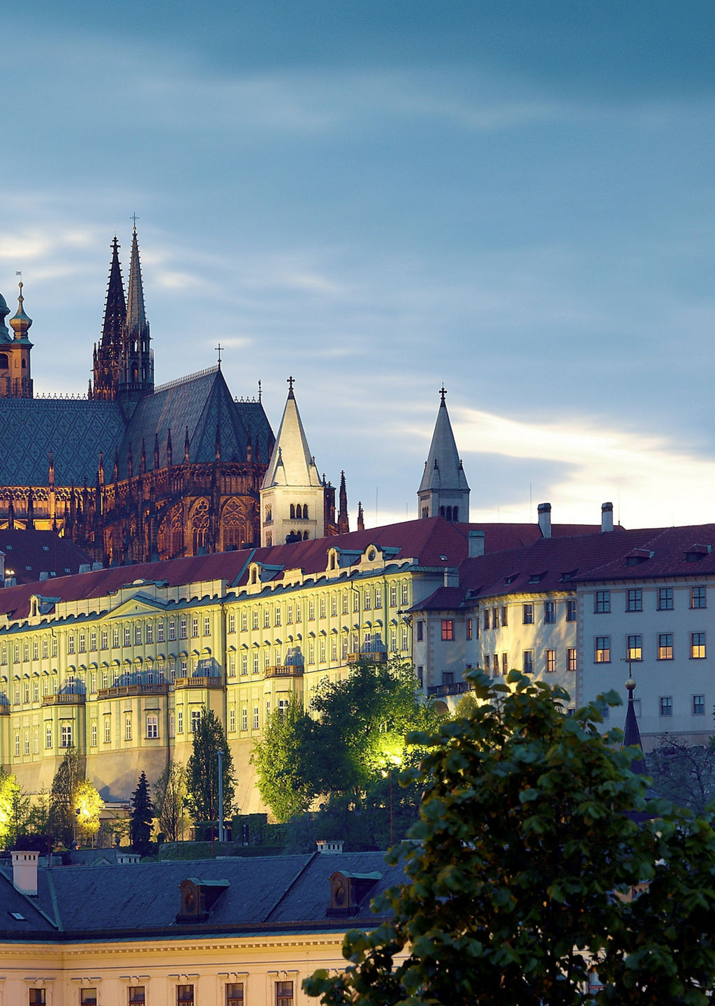 Prague Castle at dusk with streetlamp
