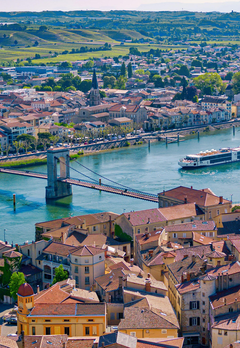 Scenic river view with bridge and town