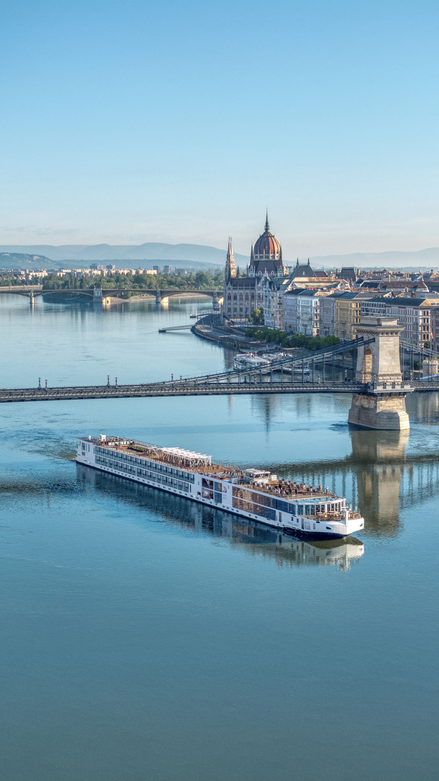 River cruise ship in Budapest cityscape