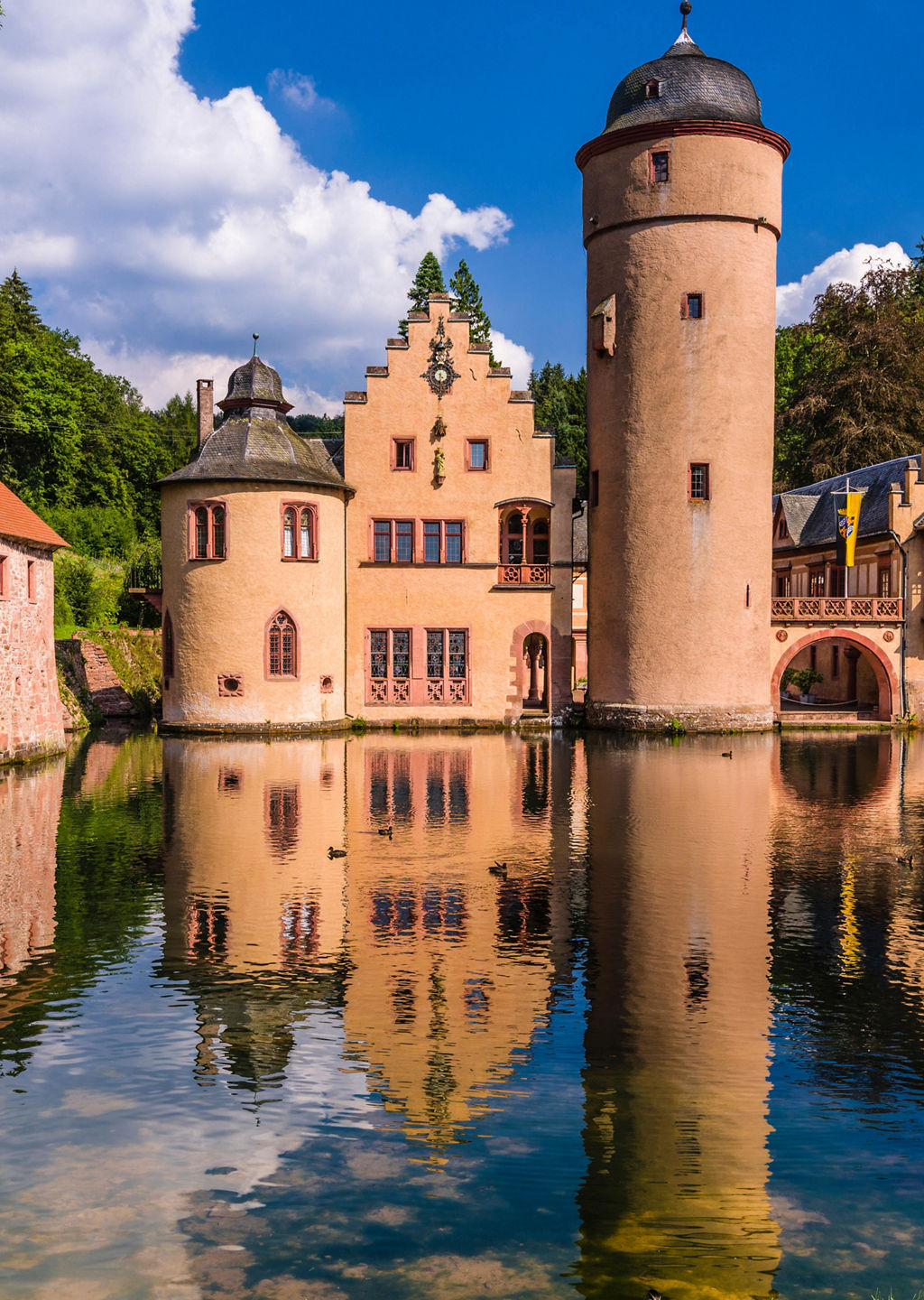 Historic castle by serene lake view