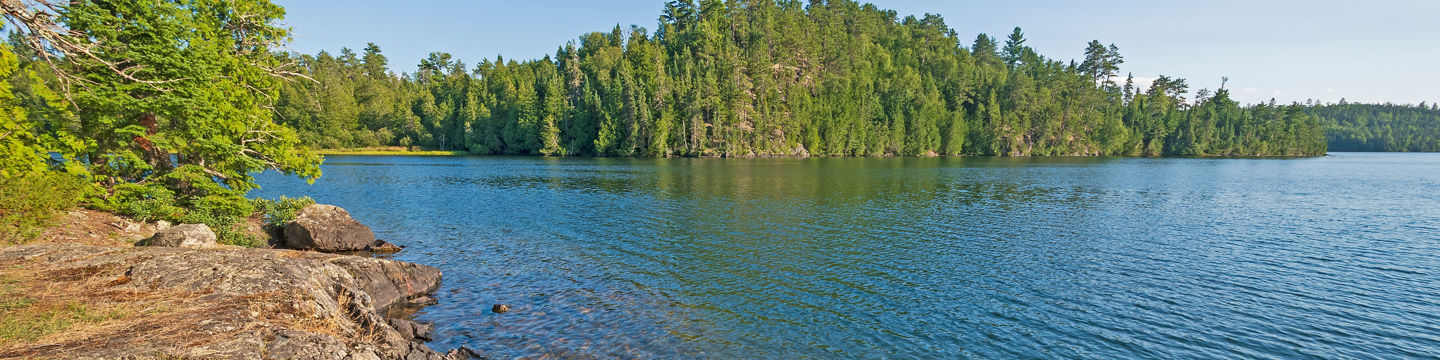 Scenic lake view with rocky shoreline