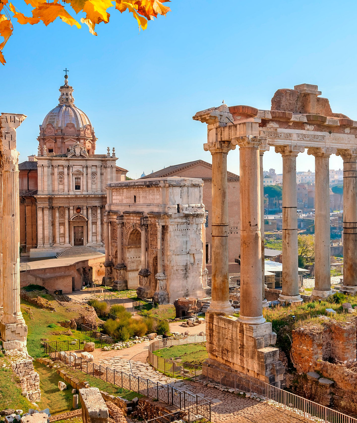 Ancient Roman ruins with autumn foliage
