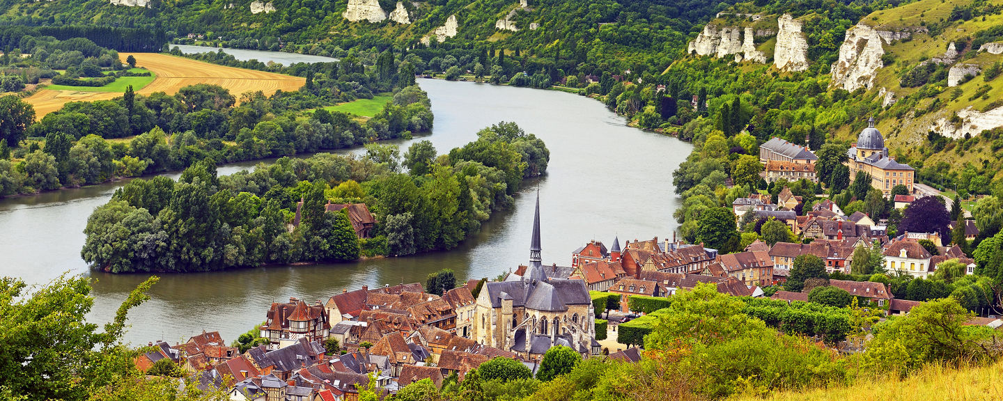 Scenic Riverside Village with Rolling Hills