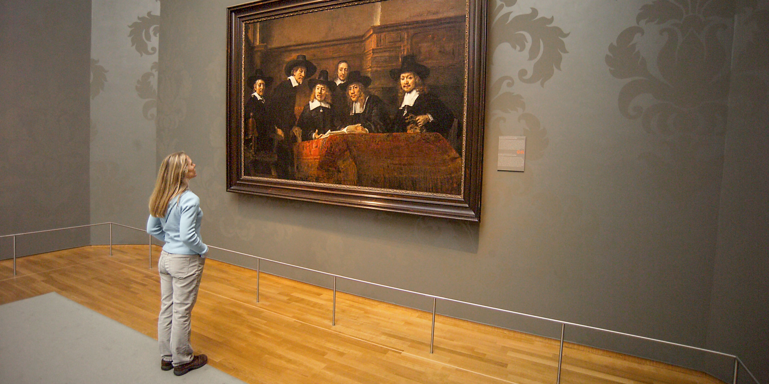 Woman Admires Painting Rijksmuseum