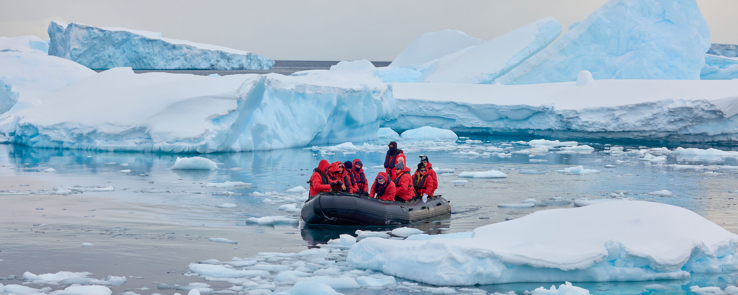 Zodiac Guests Icebergs Antarctica