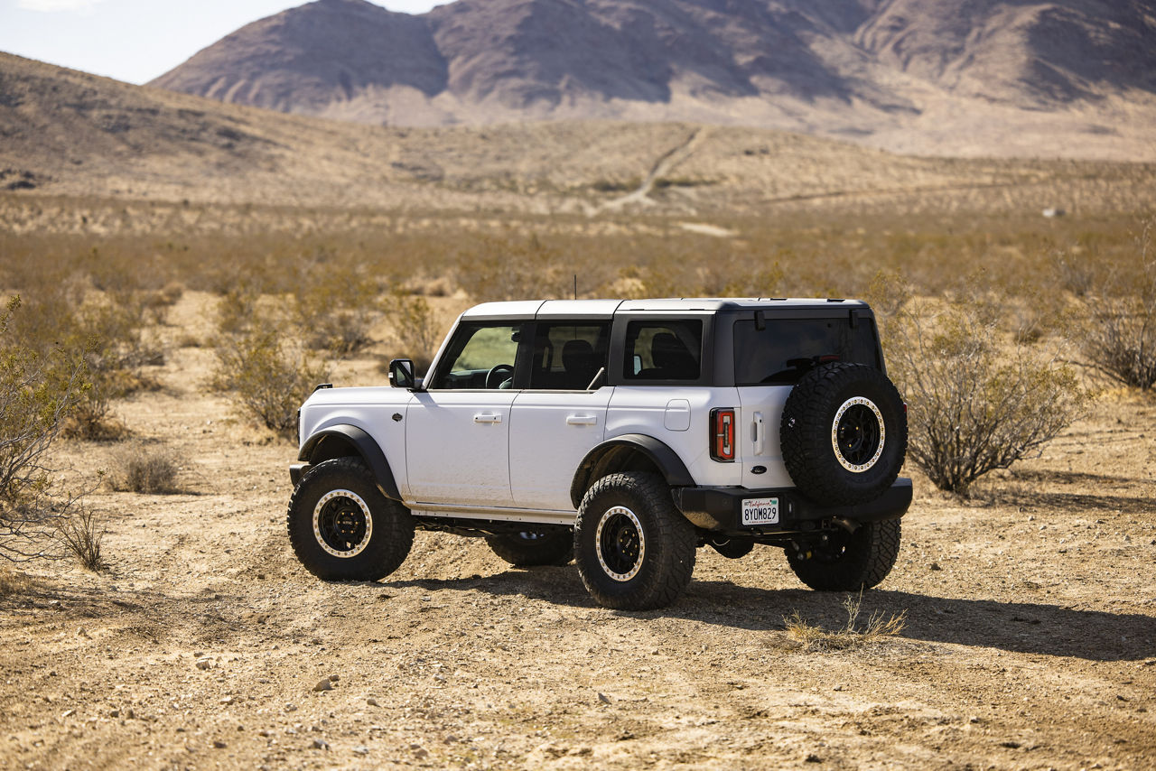 2021 Ford Bronco Raptor - KMC GRENADE DESERT BEADLOCK - Black | KMC Wheels