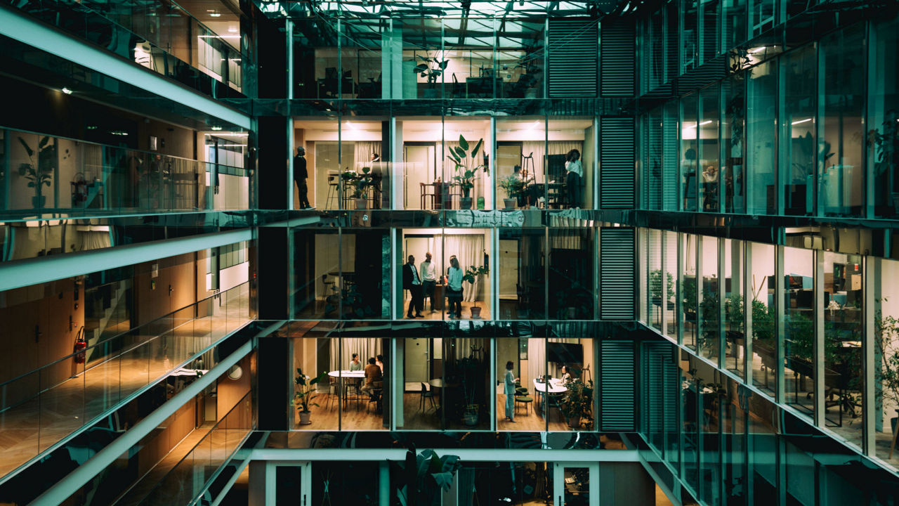 Modern office building by night in Paris, France