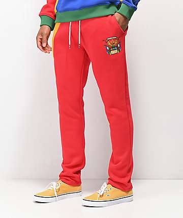 YRN Finesse On Ten pantalones deportivos en rojo, naranja, azul y verde