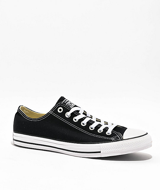 white converse with black line
